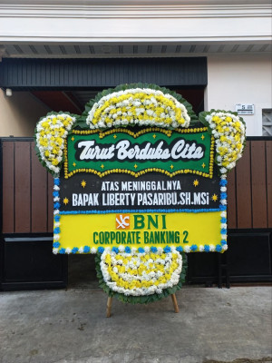 Papan Bunga Duka di Comal