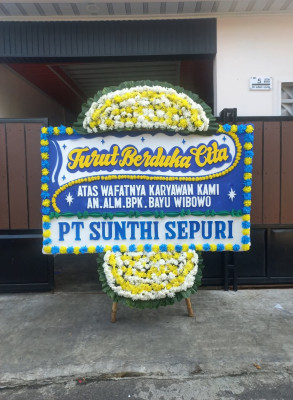 Papan Bunga Duka di Comal