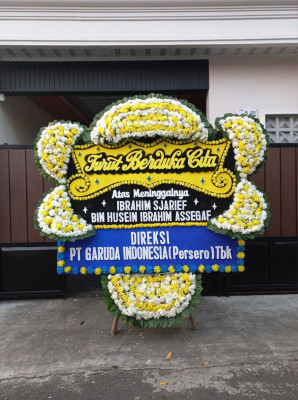 Papan Bunga Duka di Comal