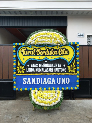 Papan Bunga Duka di Comal